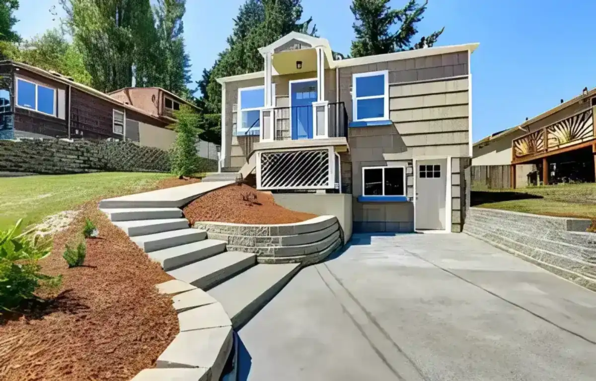concrete driveway and poured concrete steps up a sloped front yard in San Castle