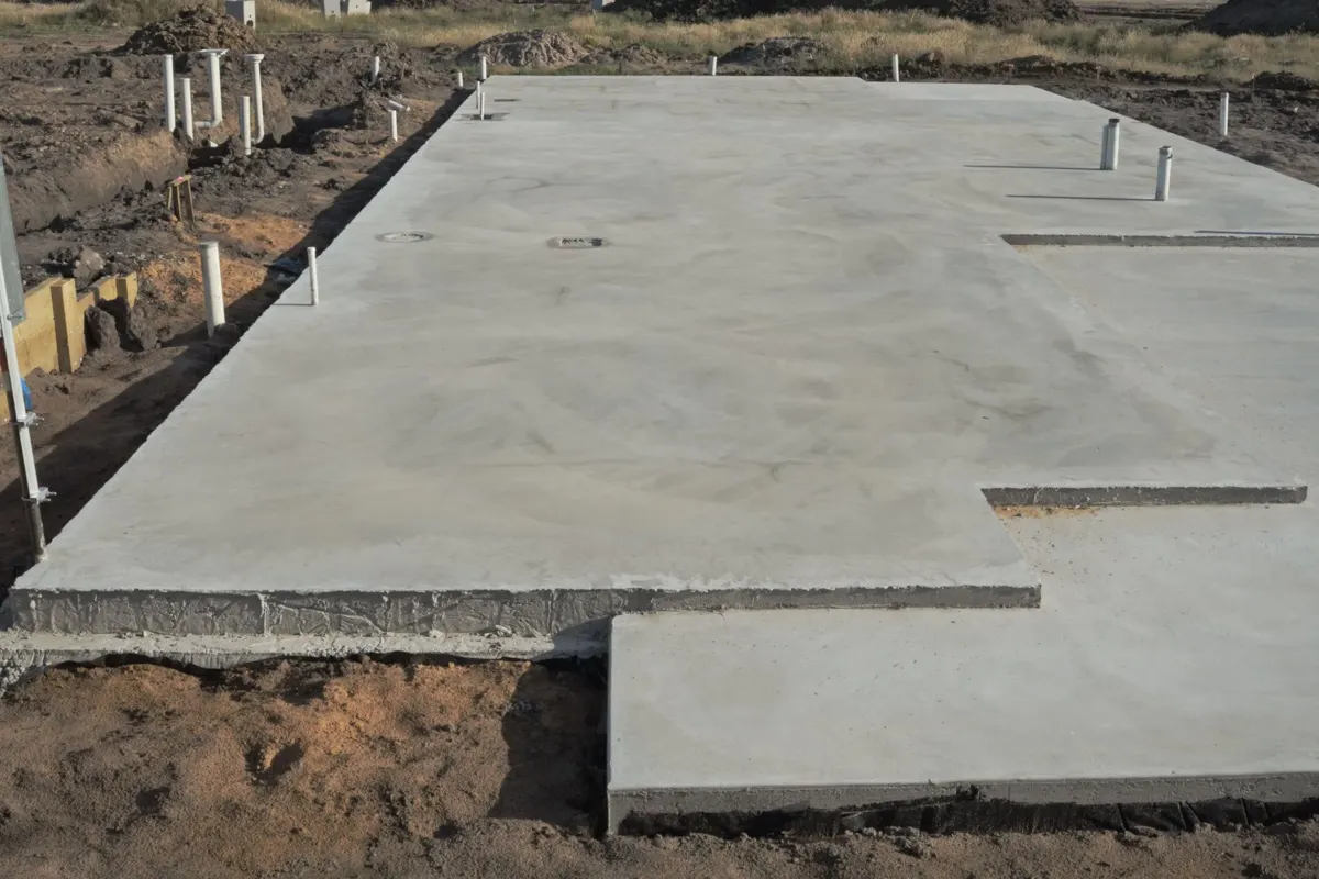 large finished concrete slab foundation with formed edges in Royal Palm Beach